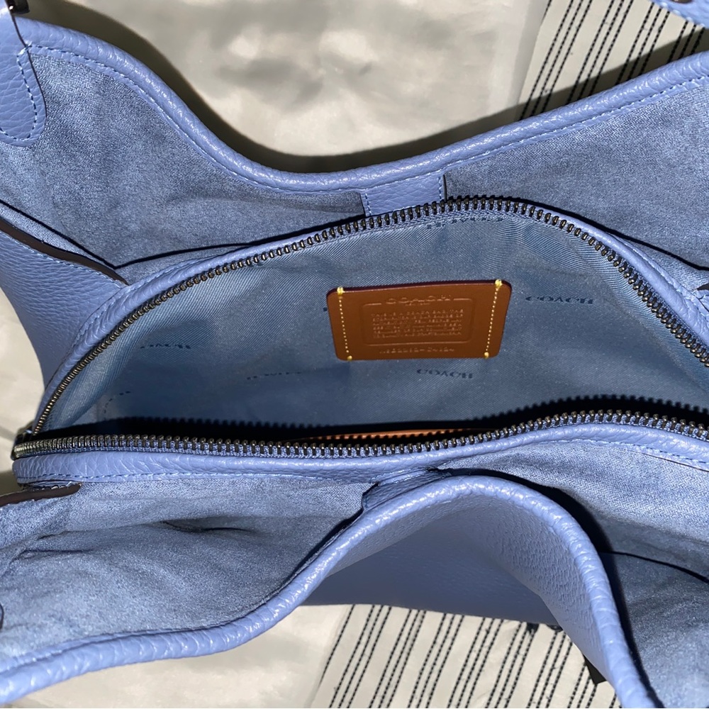 Coach hand bag, like new. Comes with duffel bag and receipt